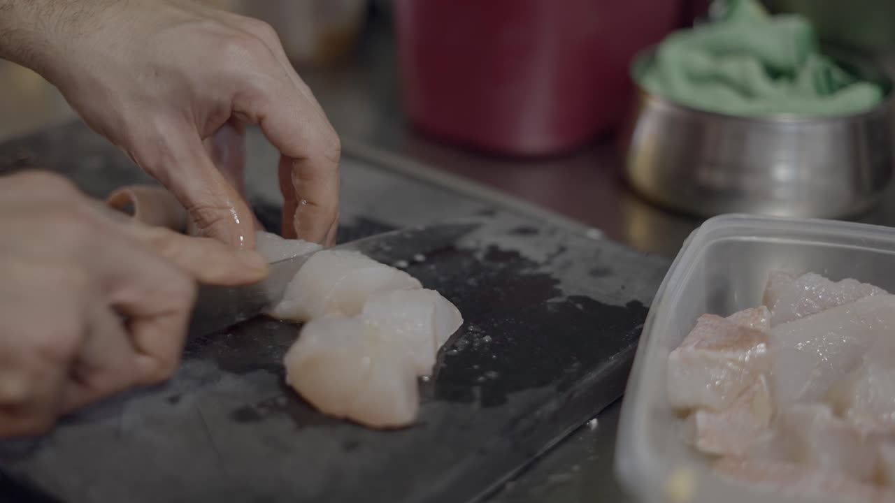 Chef Preparing Fish for Cooking