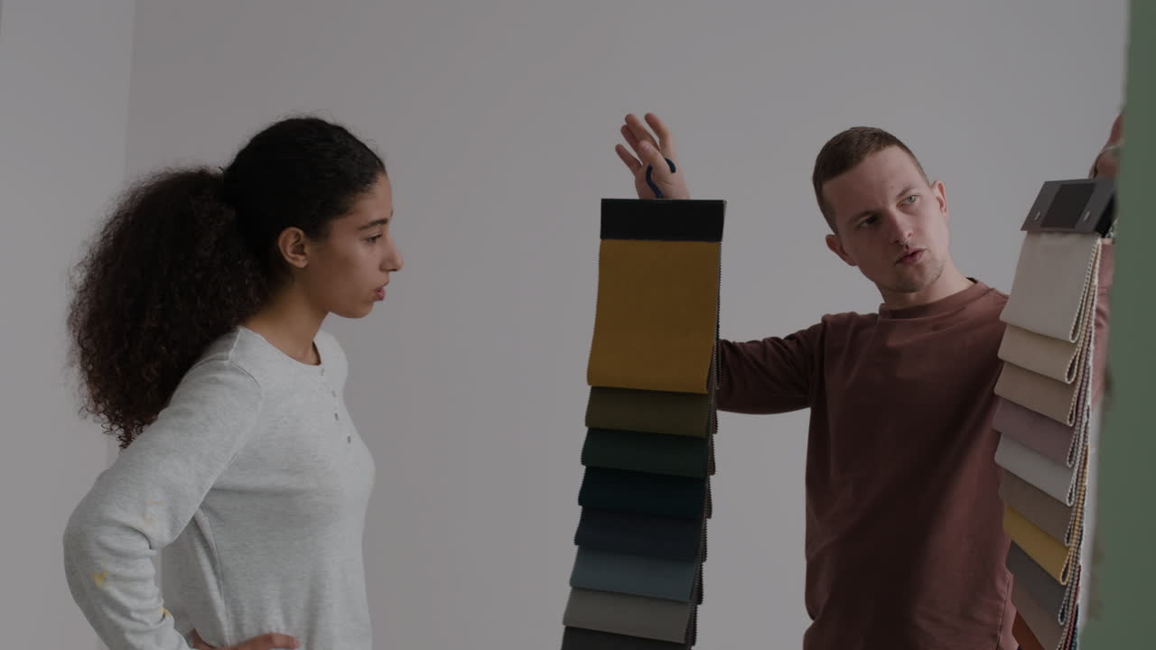 Couple Choosing Fabric Swatches for Home Decor