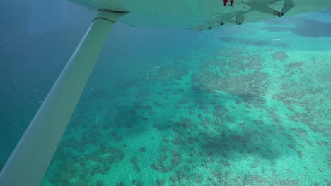 great barrier reef scenic flight aerial shot out of plane window
