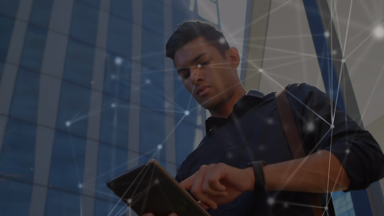 Animation of network of connections over businessman using tablet