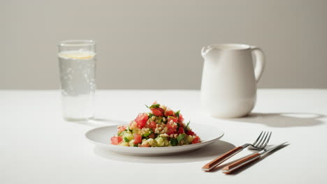 preparing a healthy tabbouleh salad