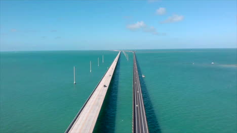 static double highway aerial drone shot of 7 mile bridge in florida keys with cars