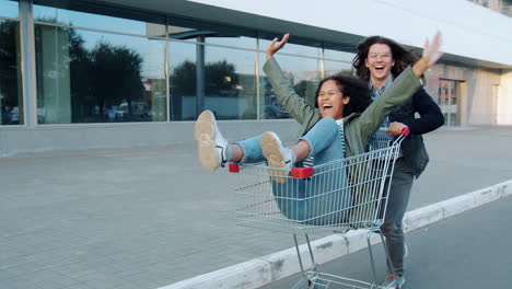 Friends Riding in Shopping Cart