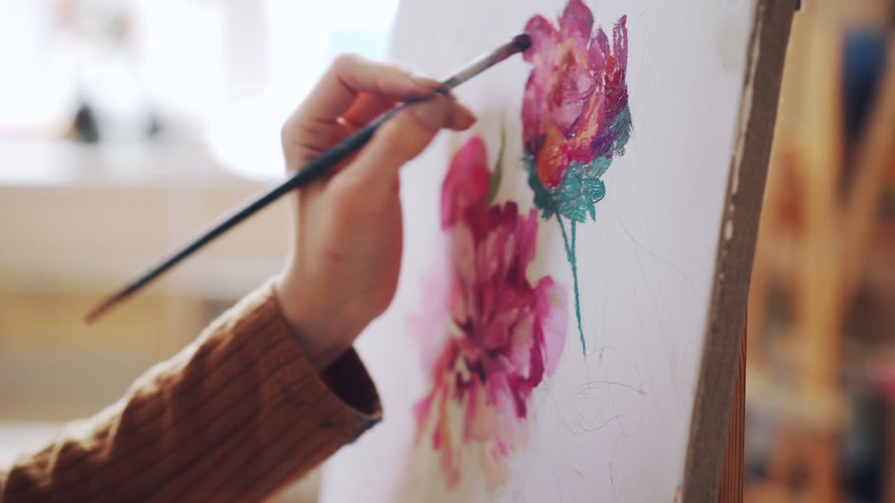 Artist Painting Flowers on Canvas