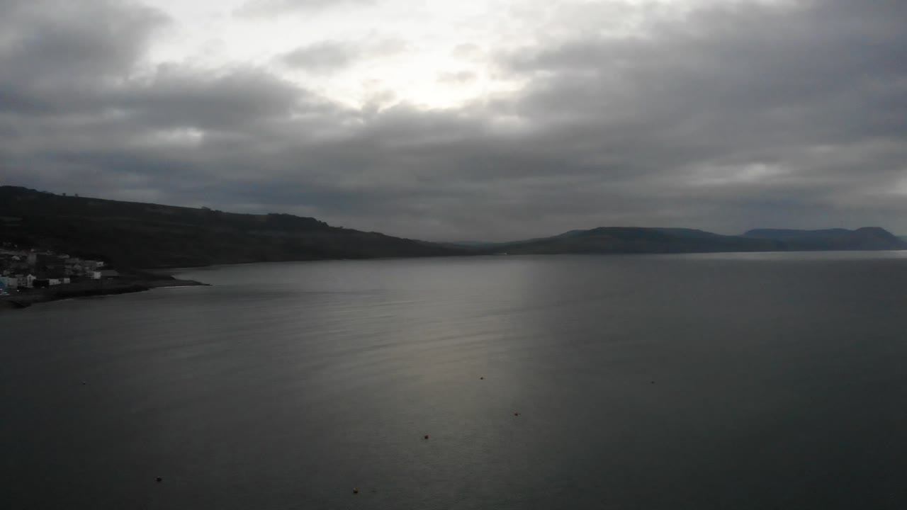 Aerial shot of Lyme Bay South West England on an early cloudy morning at sunrise
