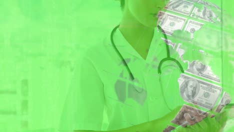 animation of globe formed with american dollars over caucasian female doctor using smartphone