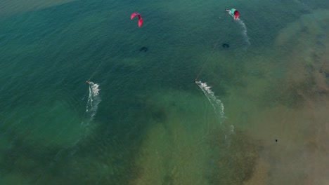 a close shot of kite surfers from a drone in the city of nin, croatia