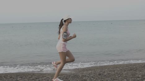 woman running on the beach