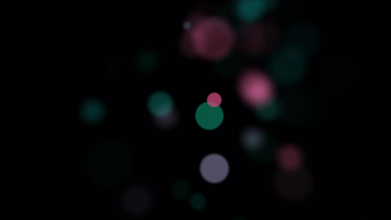 Beautiful floating moving Flashing pink blue blurred bokeh bubbles lights Seamless loop motion on black Background. pink blue particle on black  background can use as overlay or motion titles cinematic background loop.