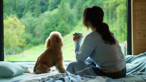 woman drinking cup of tea or coffee.