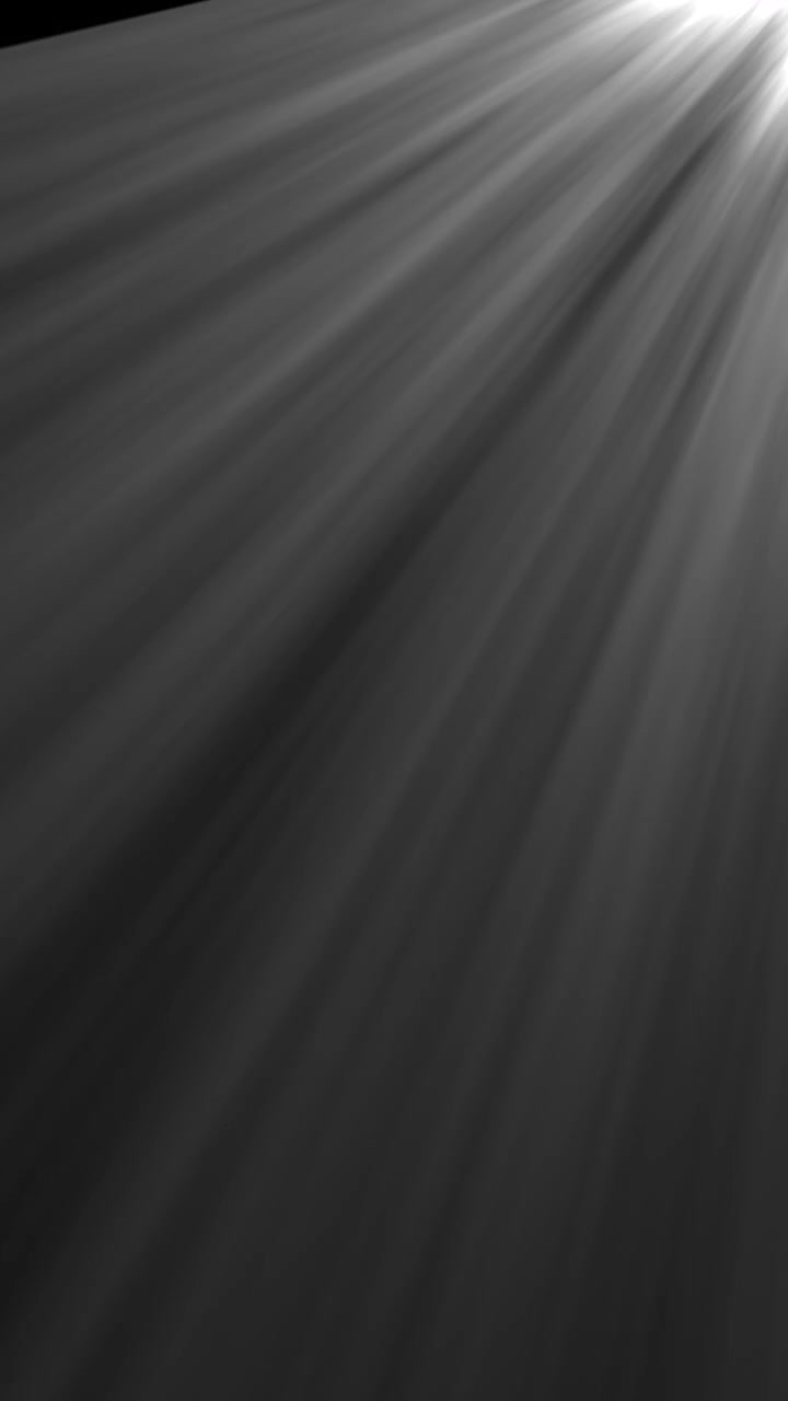 Volumetric Light Rays Shimmering on a Dark Background