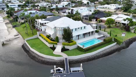 aerial view of a luxury house by the river