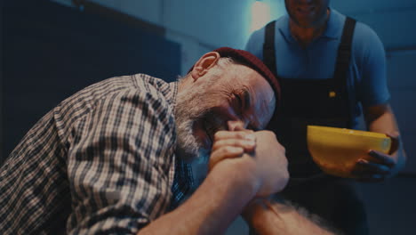 intense arm wrestling match among friends