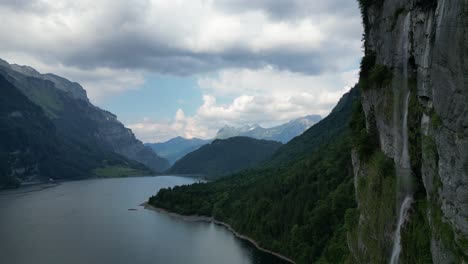 postcard perfect scene of switzerland lake,mountains and waterfall