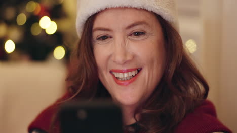 woman using phone during the holiday season