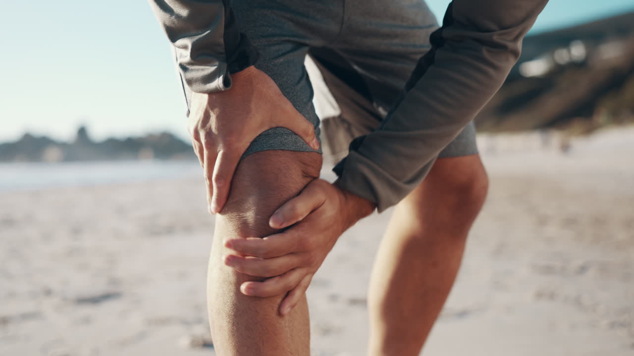 Knee pain, beach and legs of sports runner