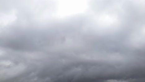 Mid-afternoon-thunderstorm-rain-clouds-forming-and-blending-across-the-african-horizon-time-lapse,-noise-free-4k-footage