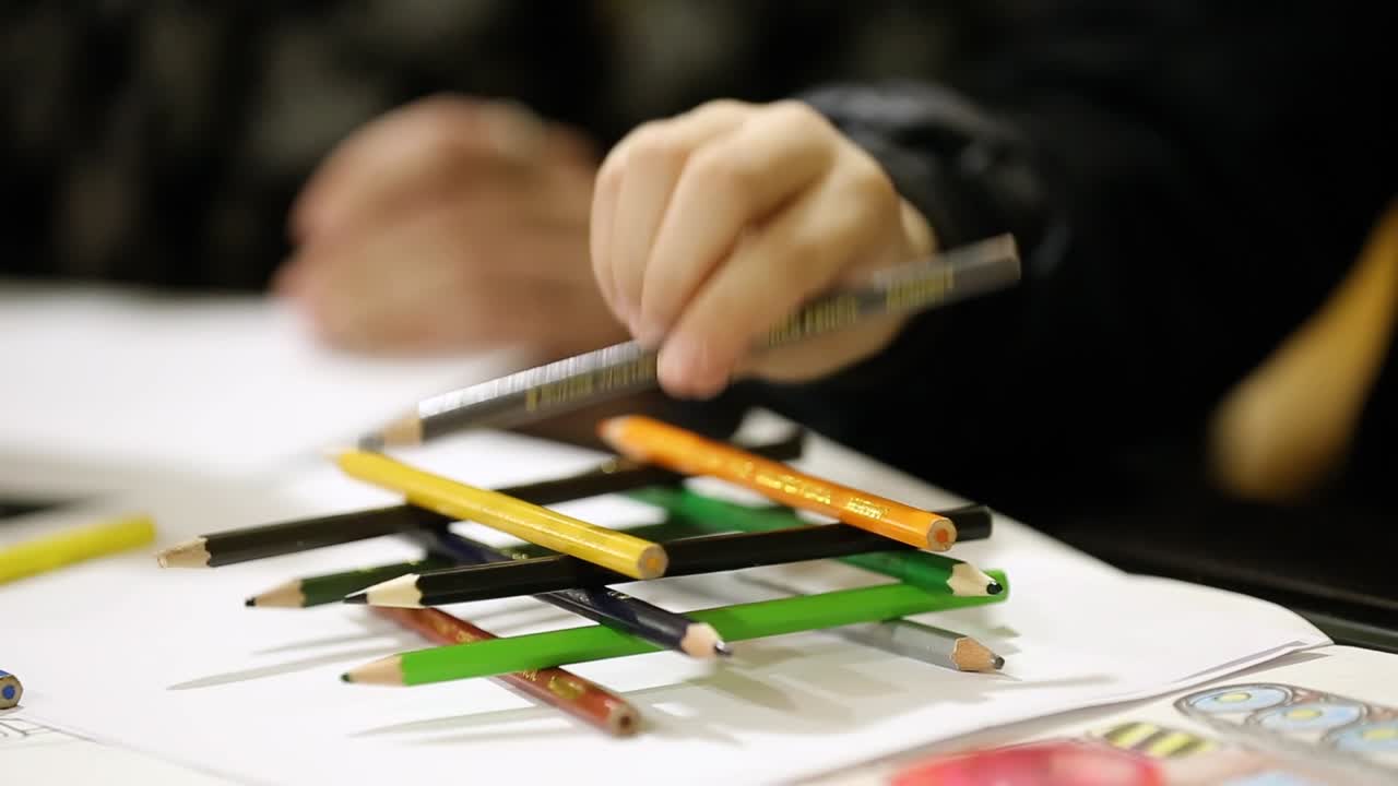 Child With Pencil In Play. Child preschooler with pencil in play room