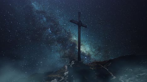 cruz en las montañas con fondo de vía láctea