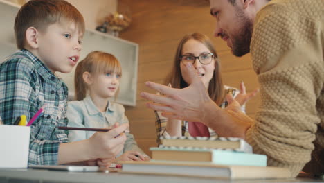 family helping children with homework