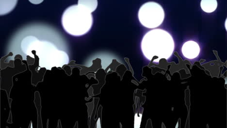 club nocturno con círculos brillantes de luz moviéndose en tonos púrpuras