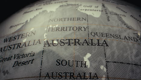 close-up of an australia map on a globe