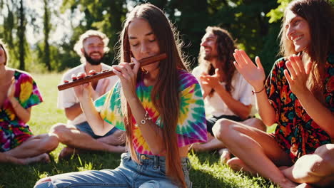 friends playing flute in a park