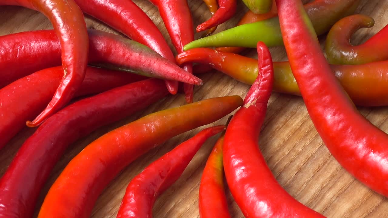 Red chilli, pepper. Shooting in the movement