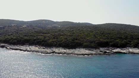 Stony-Beach-With-Dense-Vegetation-In-Emplisi-Beach-At-Kefalonia-Island,-Greece