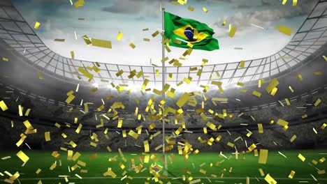 golden confetti falling over waving brazil flag against sports stadium in background