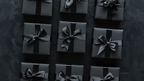 black gift boxes with black ribbons