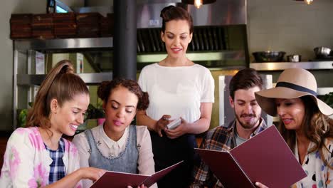 Waitress-taking-order-from-customers