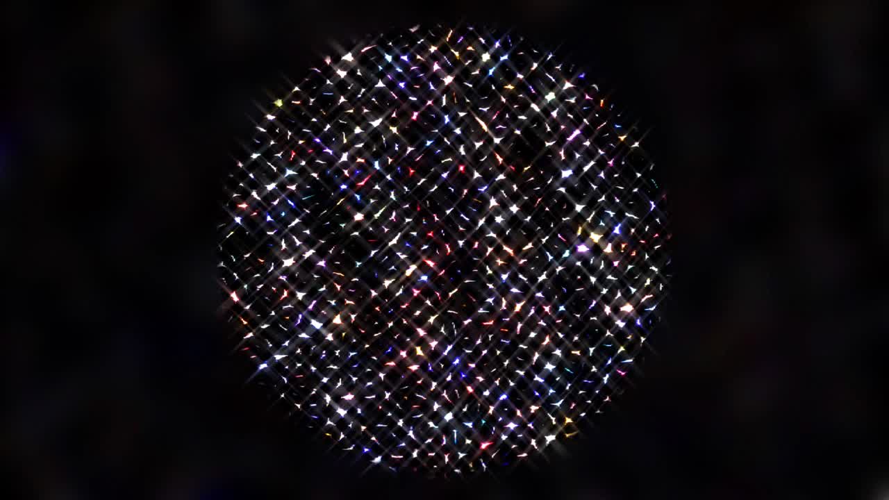 forma redonda animada de luces intermitentes a todo color, sobre un fondo negro