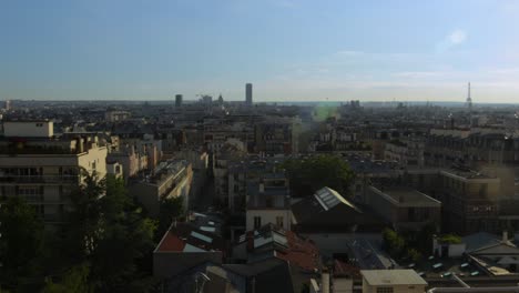 timelapse of paris view of roofs at sunset with famous monuments in the distance, few pollution and warm rich colors
