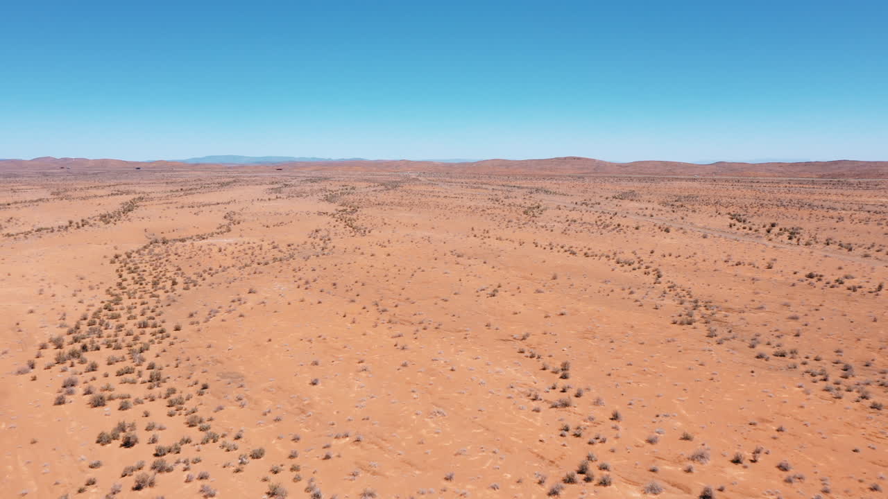 Karoo semi-desert in South Africa, slow drone fly over continuous moving shot