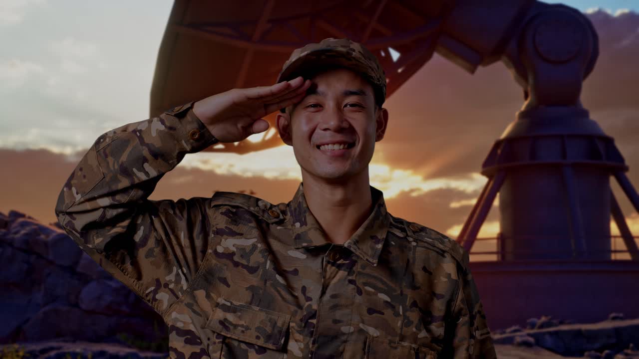 Close Up Of Asian Man Soldier Saluting And Smiling While Standing With Satellite Dish