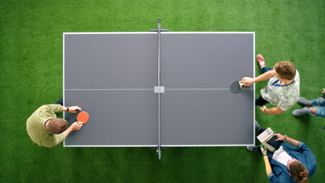 Table-tennis,-startup-business-people-in-meeting