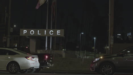 outside a police station at night