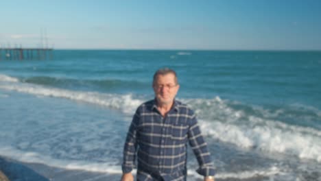 man walking on the beach