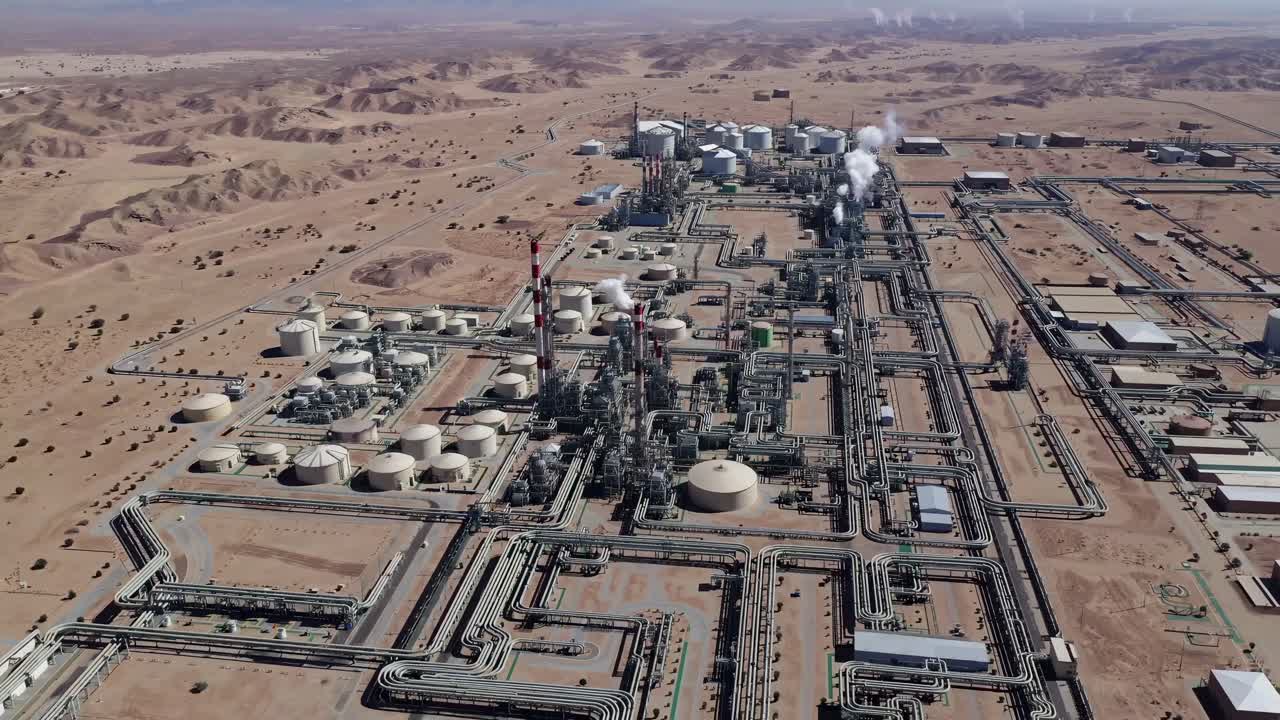 Aerial View of a Large Oil Refinery in a Desert Landscape