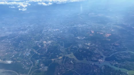 beautiful aerial view seen through window of flying airplane