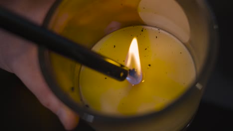 leaned in extreme close up of a candle wick