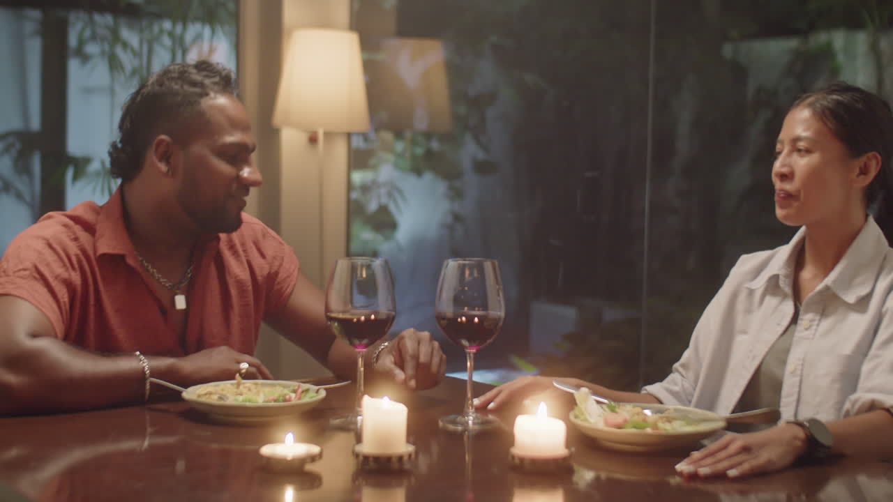 Couple Having Discussion on Dinner at Home