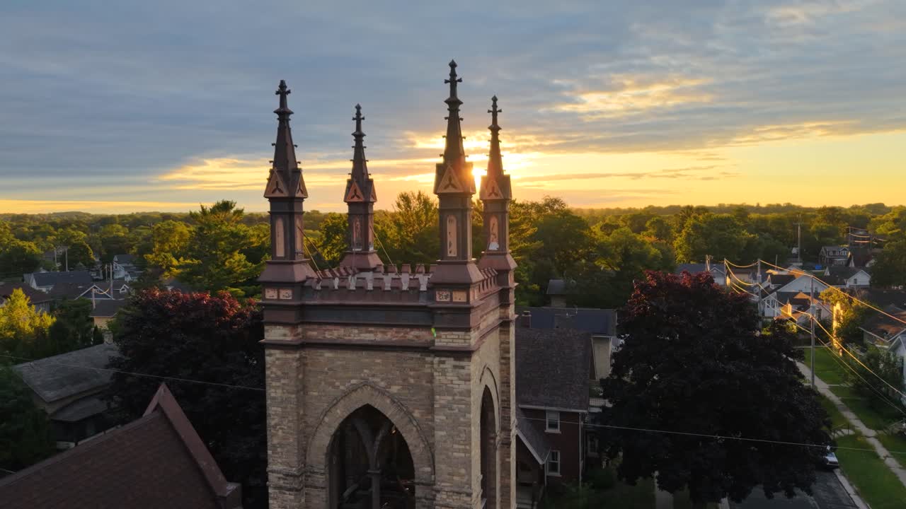 Church tower during golden sunrise