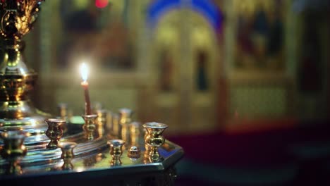 burning candle in a church