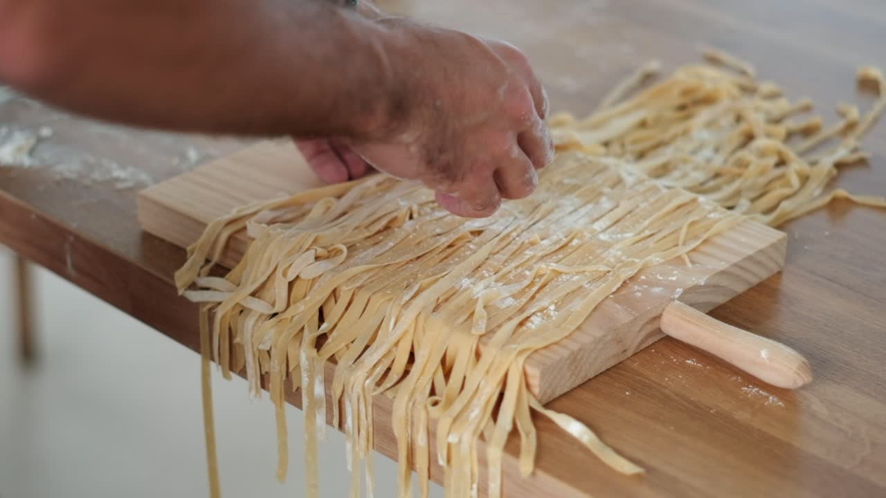 Chef's Delicate Sorting of Tagliatelle with Flour - Slow Motion Cinematic Delight - 4K