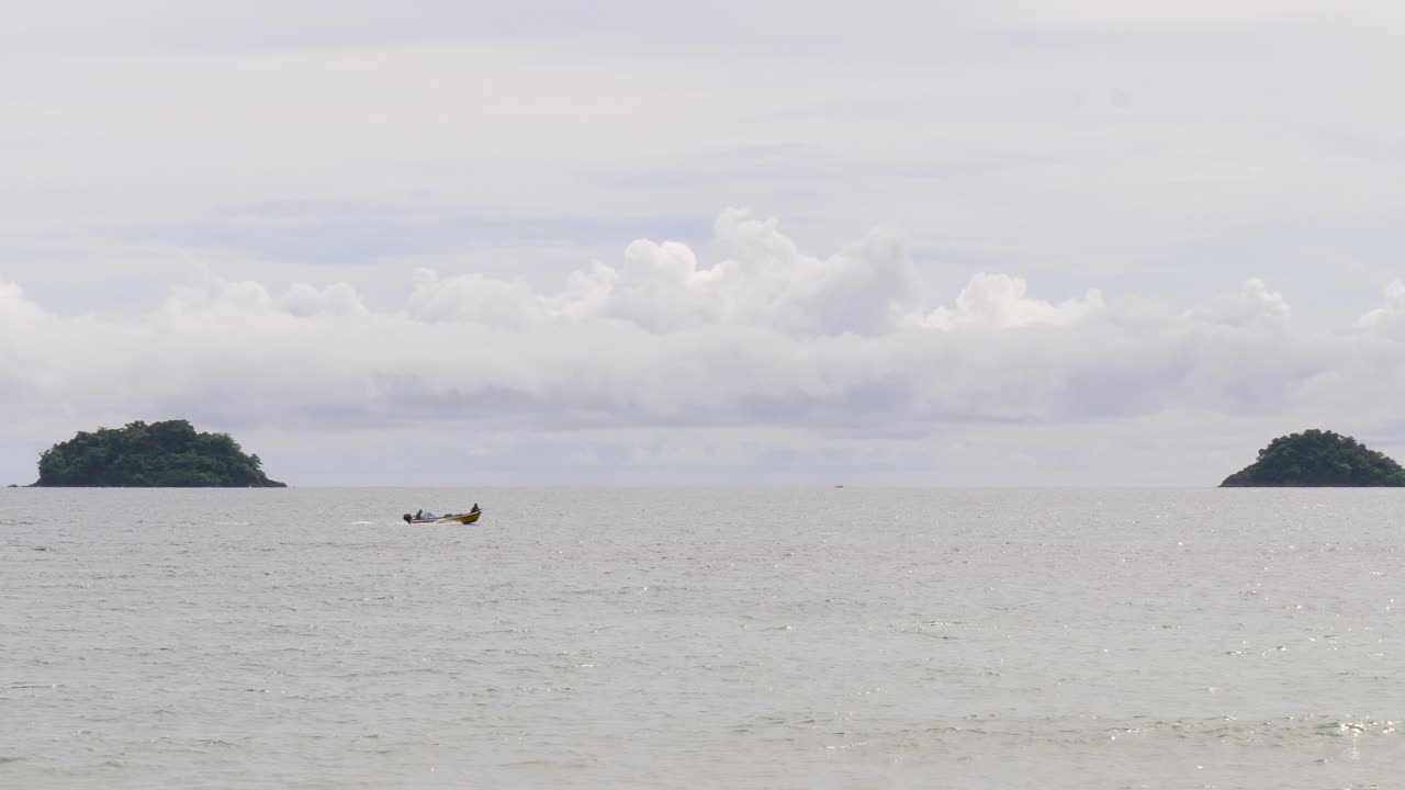 Fast long tail boat moving in Gulf of Thailand Southeast Asia tropical island