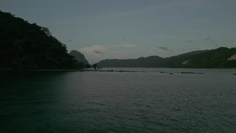 tropical bay landscape with islands at dusk