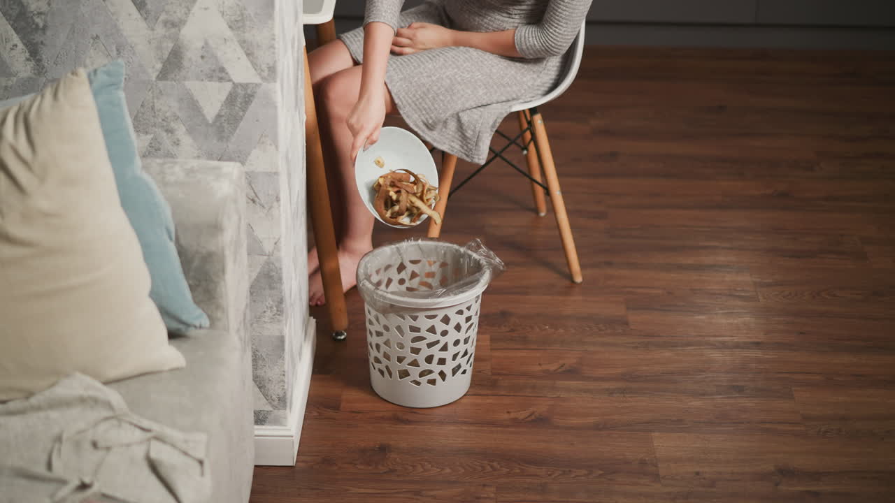 Woman cleaning up after eating