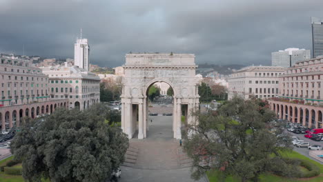 drone pullback riser of arco della vittoria in genoa, italy